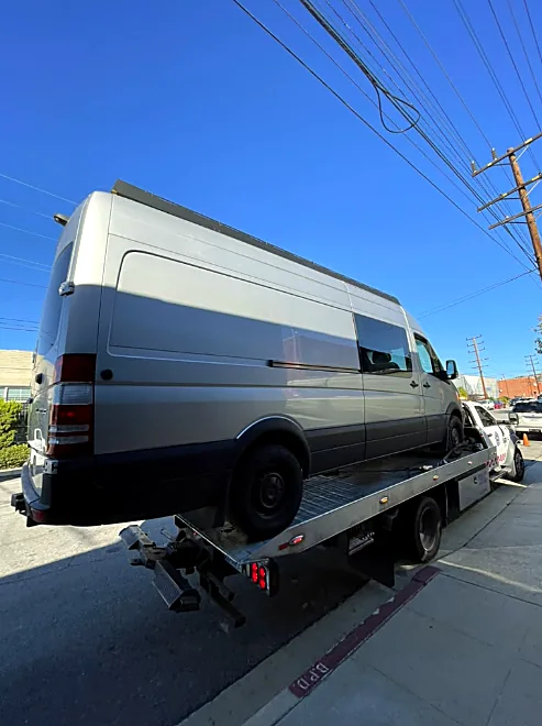Commercial vans: Sprinter van loaded on a flatbed